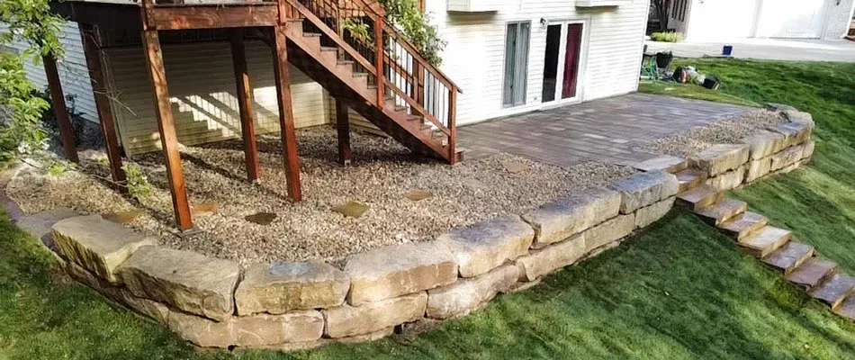 Backyard patio and retaining wall project in Edwardsville, Illinois.