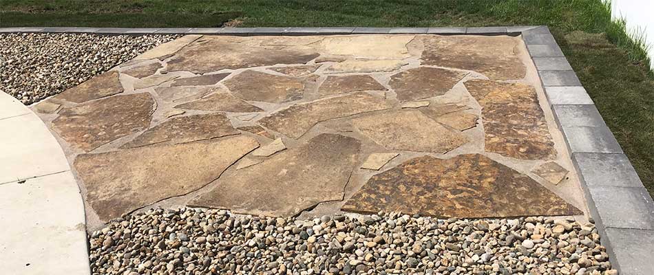 Custom flagstone patio section at a home in Maryville, IL.