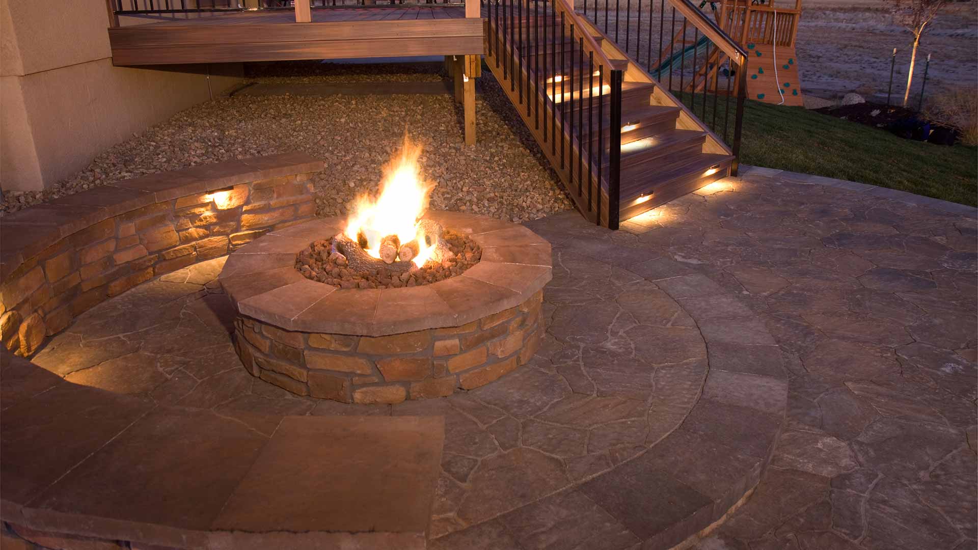 Fire pit and seating wall at a home in Bethalto, Illinois.