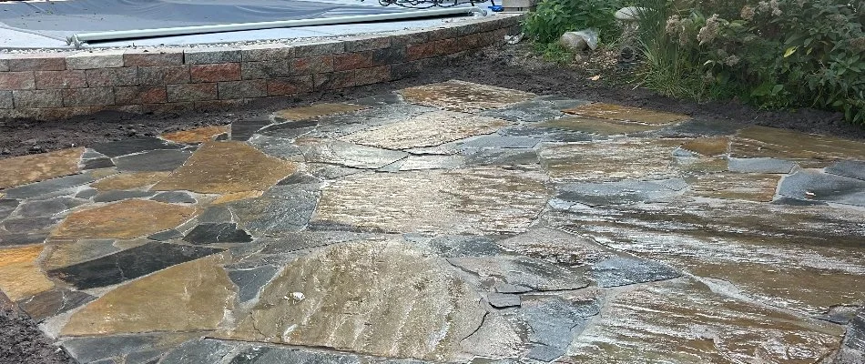 Patio in Edwardsville, IL, with blue and black flagstone.