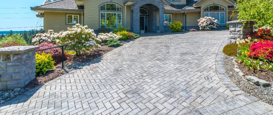 Concrete paver driveway in Edwardsville, IL, with a herringbone pattern.