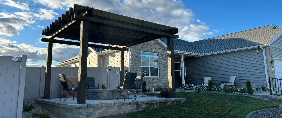 Front yard patio in Edwardsville, IL, with a wood pergola.