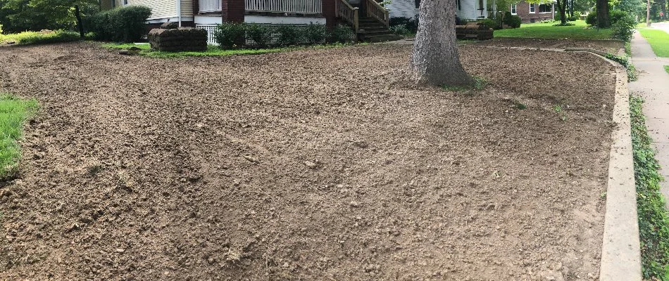 Front yard in Edwardsville, IL, with dirt.
