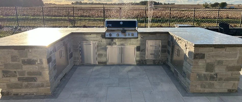 Outdoor kitchen in Edwardsville, IL, with built-in appliances.