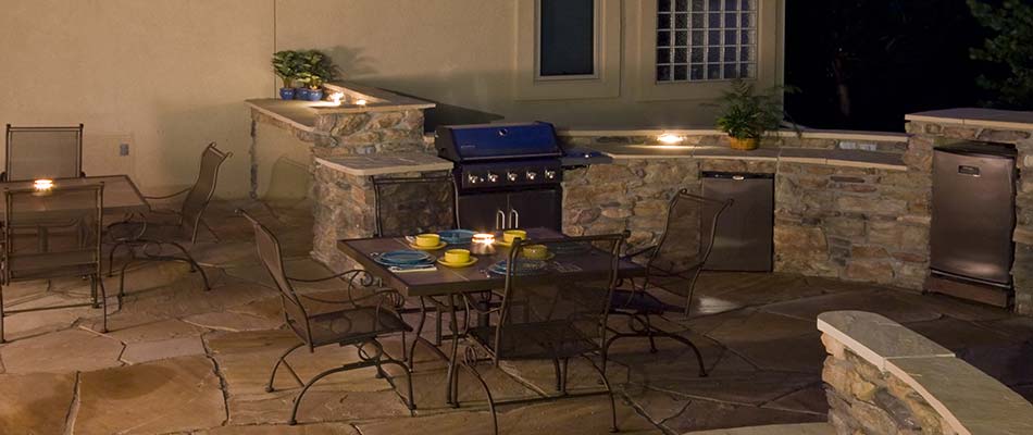 Outdoor lighting installed around an outdoor kitchen living area near Glen Carbon, IL.