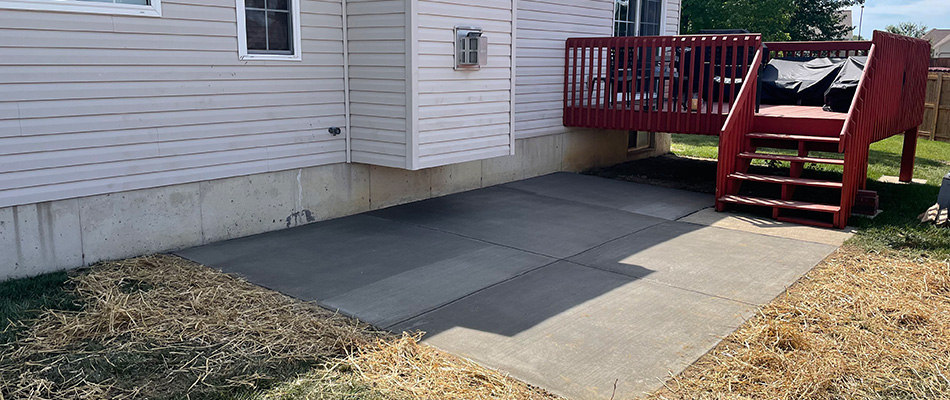 Concrete patio installed in backyard in Glen Carbon, IL.