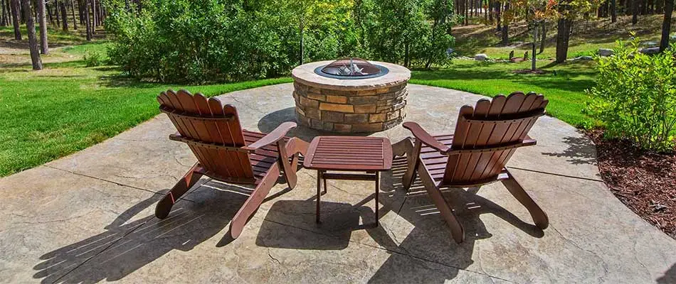 Custom fire pit and patio constructed at a home in Collinsville, Illinois.