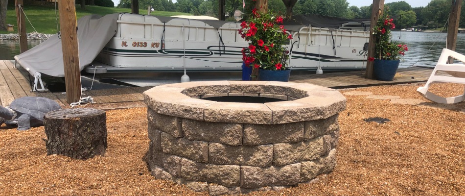 Fire pit installed beside the water in Greenville, IL.