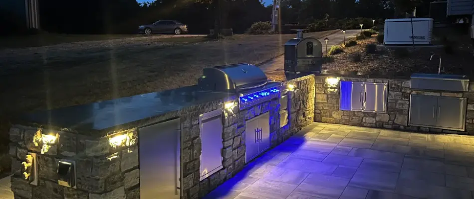 A custom brick and stone pizza oven in an outdoor kitchen installed at a home in Moro, Illinois.