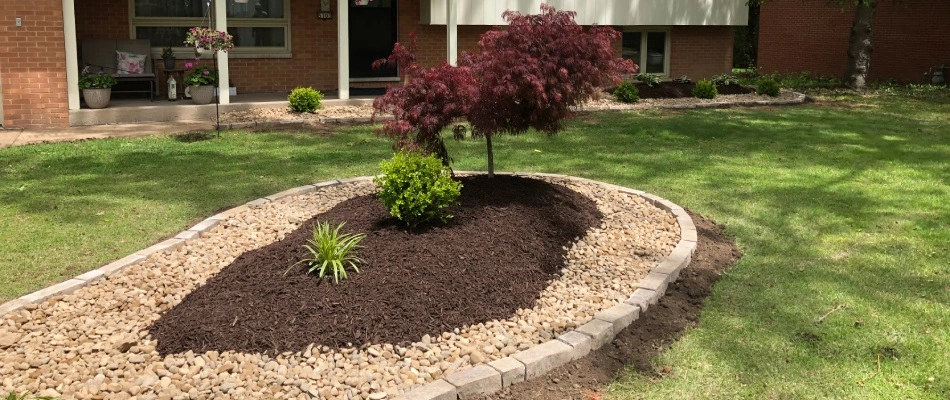 Mulch installed for new landscape bed for home front in Edwardsville, IL.