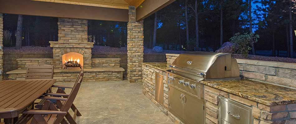 Outdoor kitchen and fireplace construction at a home in Glen Carbon, Illinois.