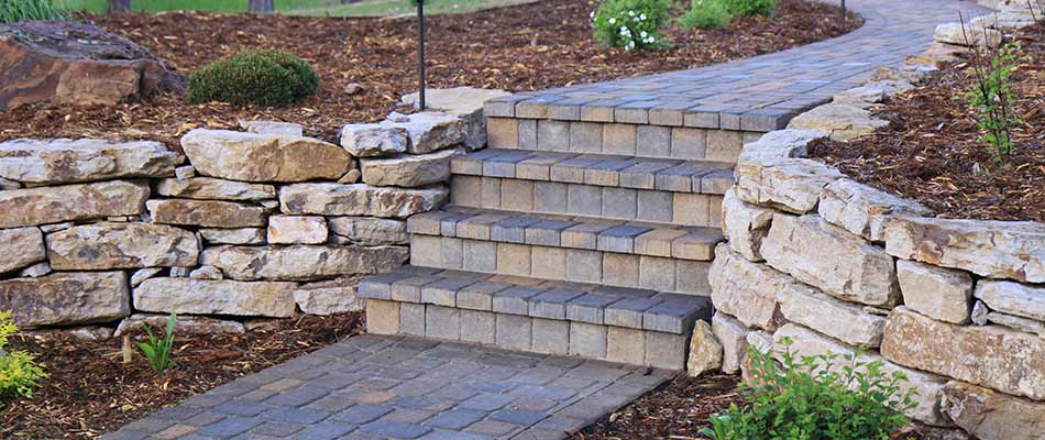 Paver walkway and stone retaining wall in Bethalto, Illinois.