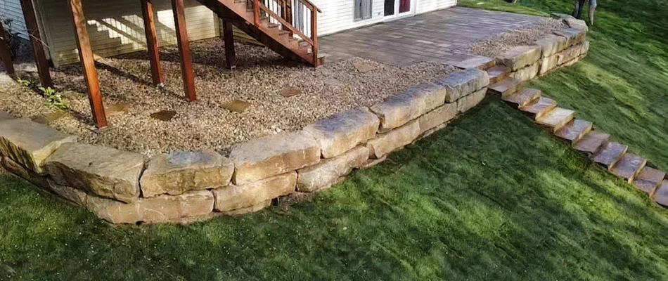 A retaining wall constructed around a patio at a home in Edwardsville, IL.