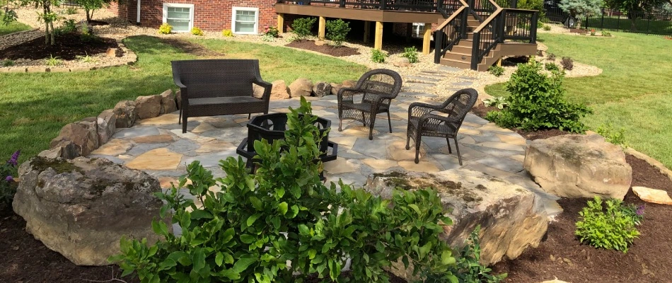 Stone patio with fire pit installed in Greenville, IL.