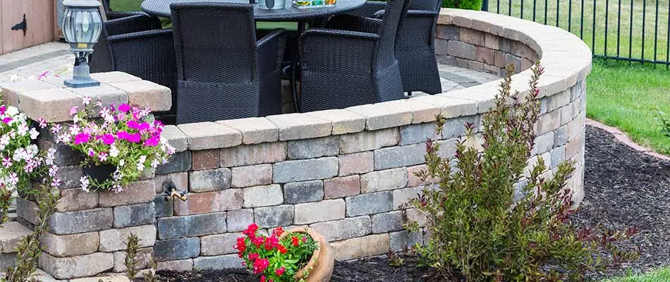 Stone paver seating wall constructed at a home in Bethalto, Illinois.