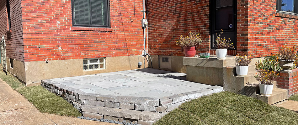 Stone retaining wall and patio installed in Edwardsville, IL.